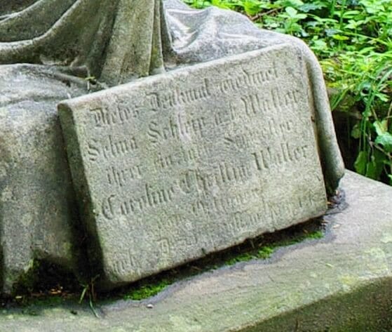 The inscription reads: “It is certain in God's wisdom that from our dearest loved one we must part.”