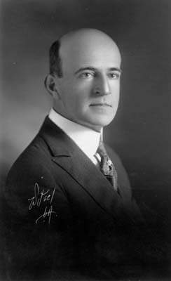 Photo of Perry Marion Parker wearing a suit and posing in a side profile