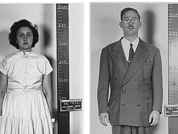 Ethel wearing a white dress and Julius Rosenburg in a suit, getting their prison mug shot taken.